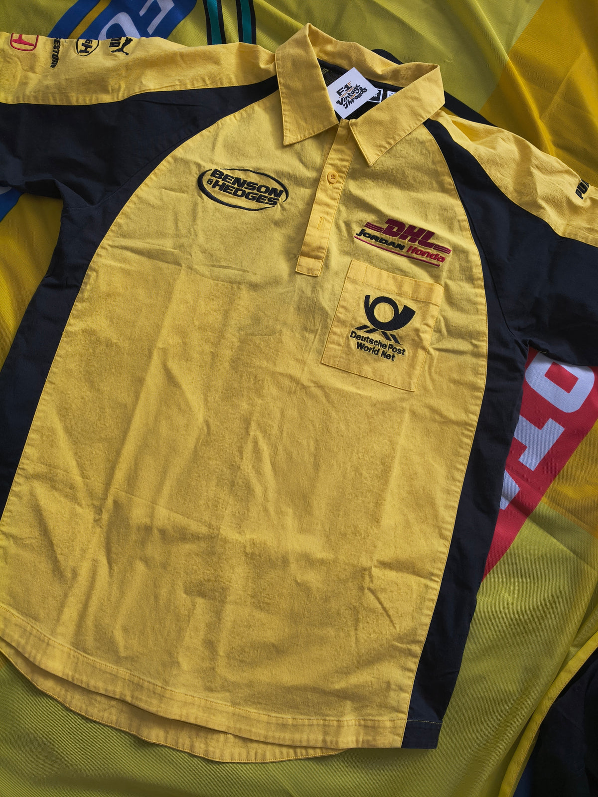 2002 Official DHL Jordan Honda team polo shirt by Puma vintage F1